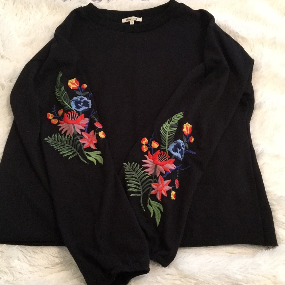 Sweater with embroidered sleeves